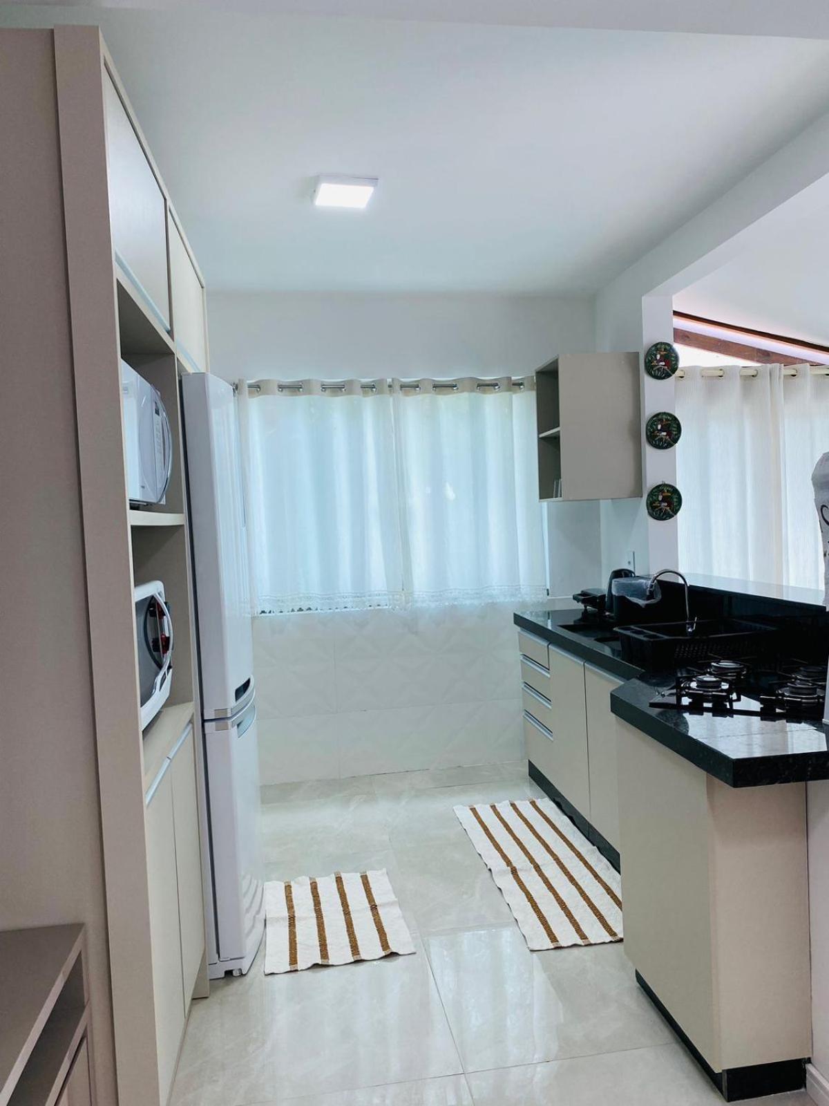 Residencial Com Piscina Possui Jacuzzi Aquecida Com Hidromassagem Villa Bombinhas Exterior photo
